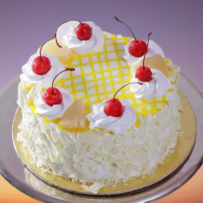 Classic Pineapple Cake with Cherry Toppings